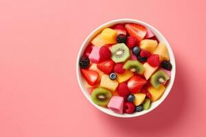 AI generated Bowl of healthy fresh fruit salad on pink background, top view. generative ai. photo