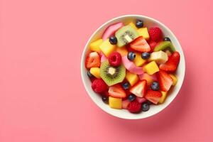 AI generated Bowl of healthy fresh fruit salad on pink background, top view. generative ai. photo