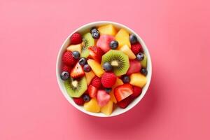 AI generated Bowl of healthy fresh fruit salad on pink background, top view. generative ai. photo