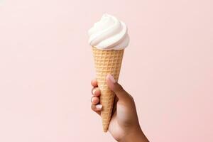 AI generated Delicious vanilla milk ice cream cone being held by a hand on solid pastel color background photo