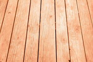 Light wood planks peach color of the year 2024 photo