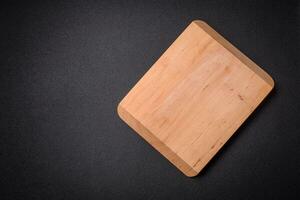 Empty wooden cutting board for preparing ingredients for preparing a delicious dish photo