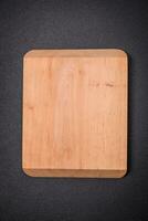 Empty wooden cutting board for preparing ingredients for preparing a delicious dish photo