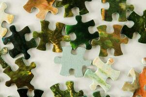 a puzzle piece is shown with a piece missing photo