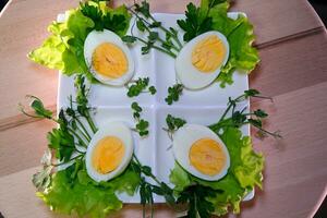 sliced cooked eggs for Easter Sunday breakfast photo