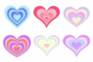 Y2k blurred heart. Gradient aesthetic stickers with soft glow effect and aura. Cute smooth futuristic vector collection on white background photo