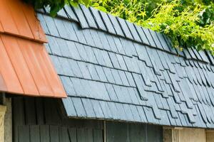 red brick wall house roof details closeup photo