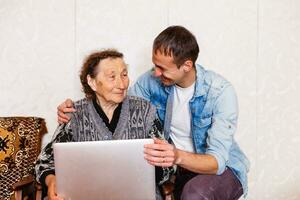 picture of a senior woman and a young man photo