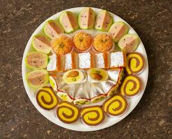 Indian Traditional Mix Sweets Food Served in Special Decorative Plate on Vintage Background photo