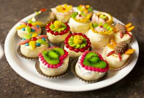 Indian Traditional Mix Sweets Food Served in Special Decorative Plate on Vintage Background photo