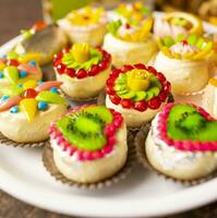 Indian Traditional Mix Sweets Food Served in Special Decorative Plate on Vintage Background photo