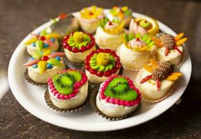 Indian Traditional Mix Sweets Food Served in Special Decorative Plate on Vintage Background photo