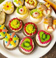 Indian Traditional Mix Sweets Food Served in Special Decorative Plate on Vintage Background photo