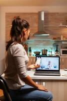 Medical specialist talking with patient during video conference about treatment. Physician giving consultation to sick patient from hospital office during virtual examination, medicine, appointment. photo