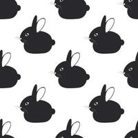 Black rabbit with long ears on a white background. Seamless cute pattern with animals for decorative fabrics. Vector. vector