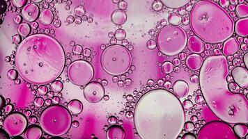 Abstract Colorful Food Oil Drops Bubbles and spheres Flowing on Water Surface video