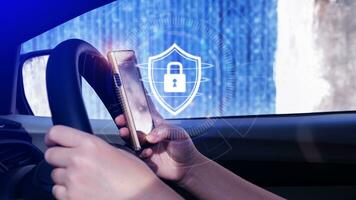 Woman driver holding smartphone with shield protection icon in car, Security shield Lock Security, Protect Concept display, secure and safe your data concept photo