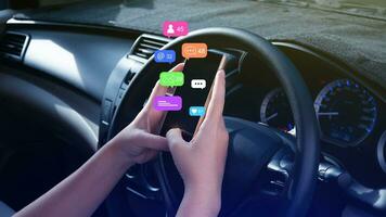 Woman using social media and digital online marketing concepts on mobile phones with icons such as notifications, messages, comments on the smartphone screen in car. photo