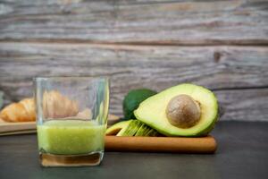 Breakfast set Avocado smoothie in a glass and bread healthy food photo