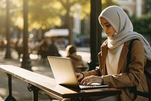 AI generated Muslim woman in hijab working on laptop photo