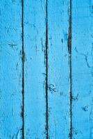 Old painted wood with weathered paint photo