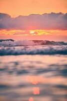 Waves in colorful Sunset photo