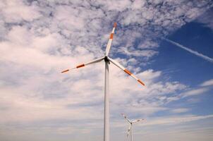 wind turbines in the sky photo