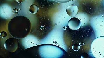 Abstract Colorful Food Oil Drops Bubbles and spheres Flowing on Water Surface video