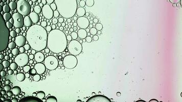 Abstract Colorful Food Oil Drops Bubbles and spheres Flowing on Water Surface video