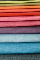 a stack of colorful fabric photo