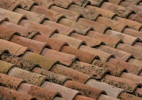 a close up of a roof with many tiles photo