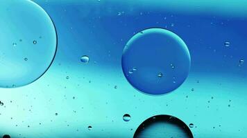 Abstract Colorful Food Oil Drops Bubbles and spheres Flowing on Water Surface video