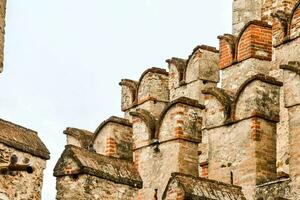 the tower of the church of san giovanni in pisa, italy photo