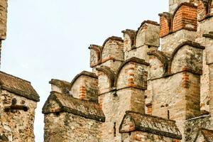 the tower of the church of san giovanni in pisa, italy photo