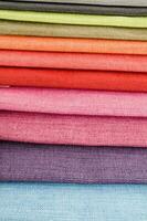 a stack of colorful fabric photo