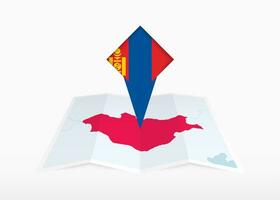 Mongolia is depicted on a folded paper map and pinned location marker with flag of Mongolia. vector