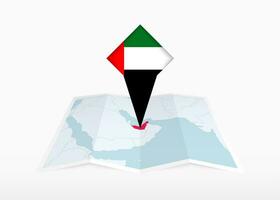 United Arab Emirates is depicted on a folded paper map and pinned location marker with flag of United Arab Emirates. vector