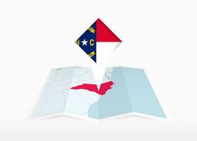 North Carolina is depicted on a folded paper map and pinned location marker with flag of North Carolina. vector