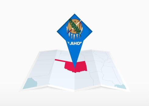 Oklahoma is depicted on a folded paper map and pinned location marker with flag of Oklahoma. vector