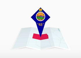 Kansas is depicted on a folded paper map and pinned location marker with flag of Kansas. vector