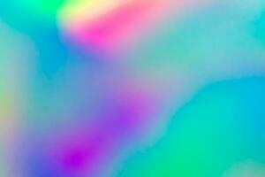 Abstract blur holographic rainbow foil iridescent background photo