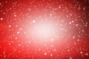 snowfall winter nature Christmas on red background photo