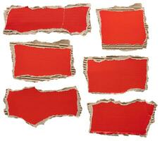 piece of red cardboard paper tear isolated on white background photo