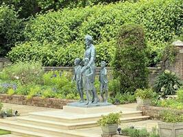 London in the UK on 10 July 2021. A view of Kensington Palace Gardens showing the statue of Diana photo