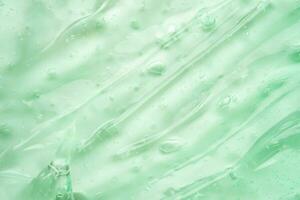 transparente claro verde líquido suero gel cosmético textura antecedentes foto