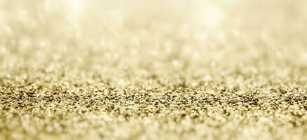 Abstract gold glitter sparkle with bokeh background photo