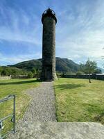 Scotland in the UK on 30 August 2021. A view of the Bonnie Prince Charlie Monument on the shores of Loch Shiel photo