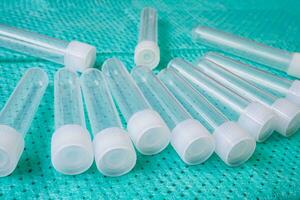 Plastic test tubes with caps for the collection of samples. Sampling tubes for laboratory examination. photo