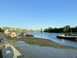 A view of the River Thames at Hammersmith showing the bridge photo