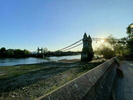 A view of the River Thames at Hammersmith showing the bridge photo